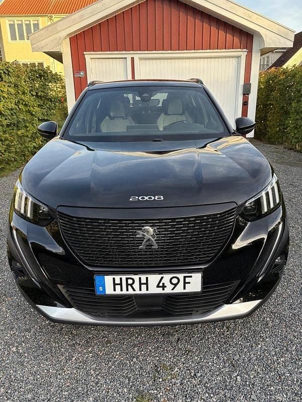 Svart Begagnad 2021 Peugeot e-2008 GT SUV | 195 000 kr (Bra pris) - Bild 1/4