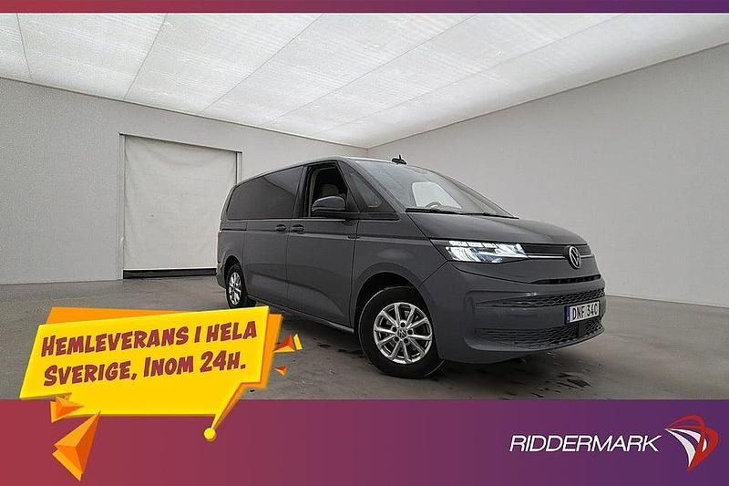 Grå Begagnad 2023 VW Multivan Van | 569 800 kr (Marknadspris) - Bild 1/3