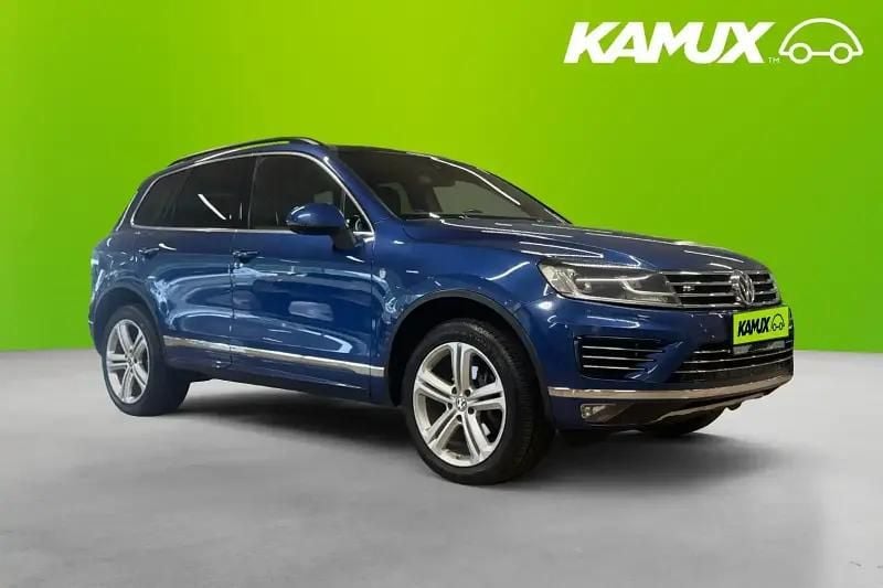 Blå Begagnad 2015 VW Touareg R-line SUV | 208 900 kr (Marknadspris) - Bild 1/4