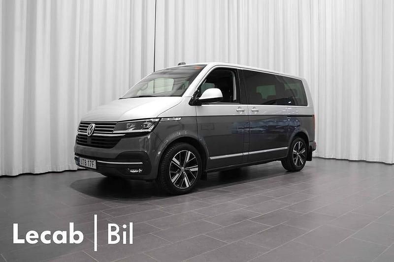 Grå Begagnad 2022 VW Multivan Van | 579 500 kr (Marknadspris) - Bild 1/4