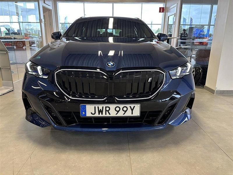 Begagnad BMW i5 Efficient Dynamics 442 kW (601 HK) 2024 Blå/lila Sedan