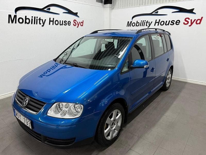 Ljusblå Begagnad 2005 VW Touran Trendline Minibuss | 39 900 kr - Bild 1/4