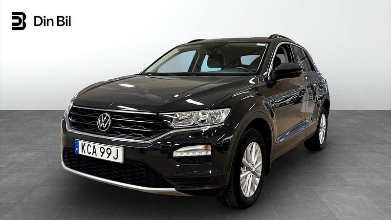 Grå (urano grey) Begagnad 2021 VW T-Roc Style SUV | 194 500 kr (Marknadspris) - Bild 1/4