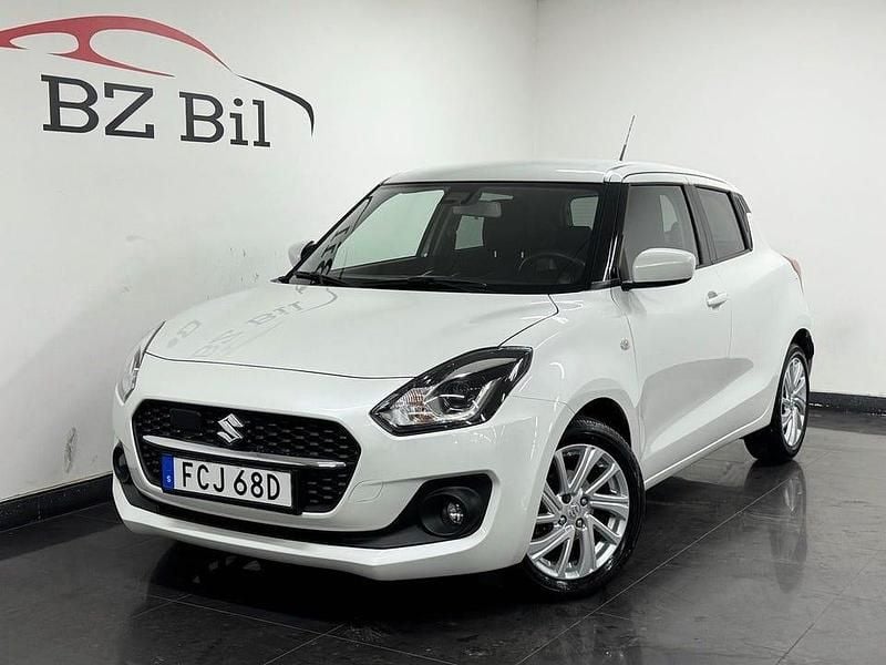Vit Begagnad 2020 Suzuki Swift Halvkombi | 154 900 kr (Marknadspris) - Bild 1/4