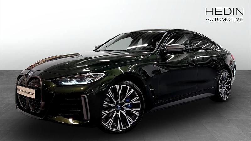 Grön (green) Begagnad 2022 BMW i4 Shadowline Sedan | 498 700 kr (Bra pris) - Bild 1/4