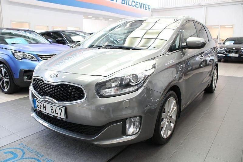 Grå Begagnad 2013 Kia Carens Minibuss | 69 000 kr (Marknadspris) - Bild 1/4