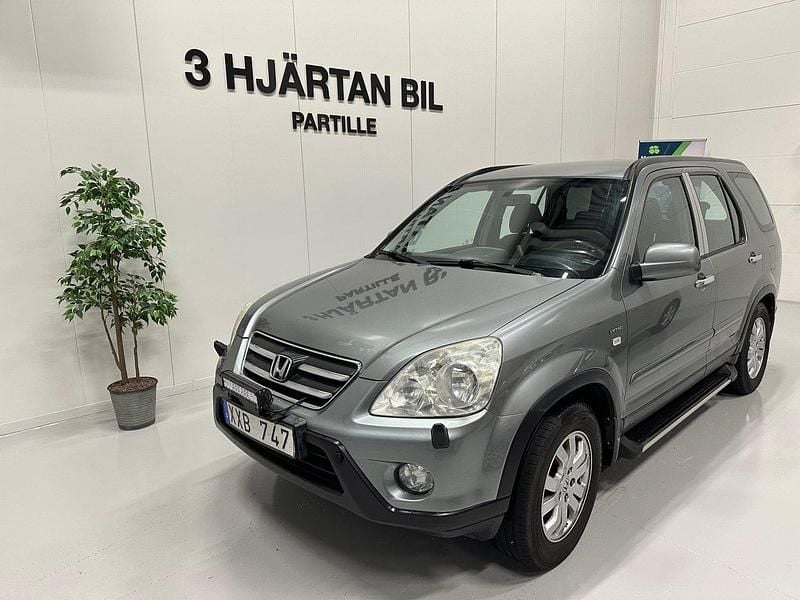 Grå Begagnad 2006 Honda CR-V SUV | 59 900 kr (Dyr) - Bild 1/4
