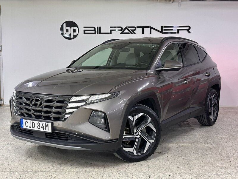 Brun Begagnad 2022 Hyundai Tucson Advanced SUV | 279 900 kr - Bild 1/4