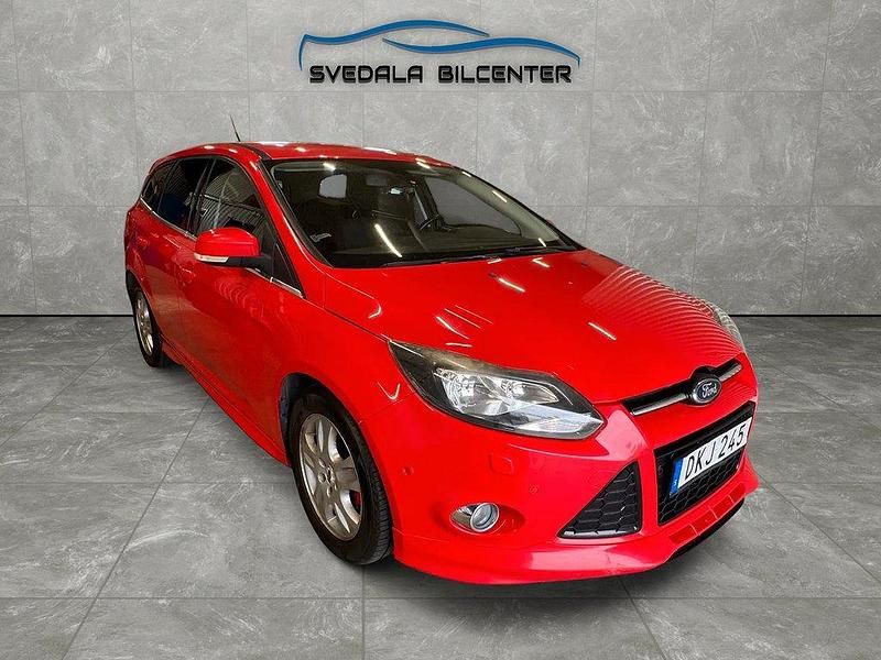 Röd Begagnad 2012 Ford Focus Titanium Kombi | 44 800 kr (Marknadspris) - Bild 1/4