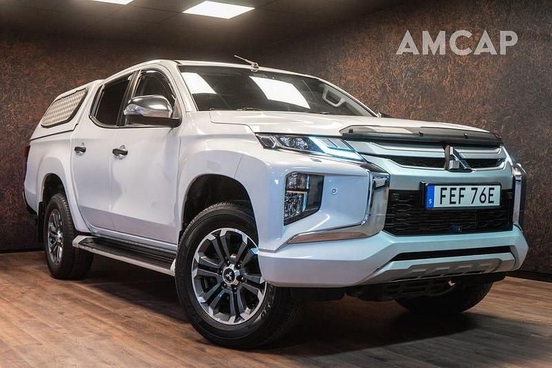 Vit Begagnad 2020 Mitsubishi L200 Pickup | 399 500 kr (Dyr) - Bild 1/4