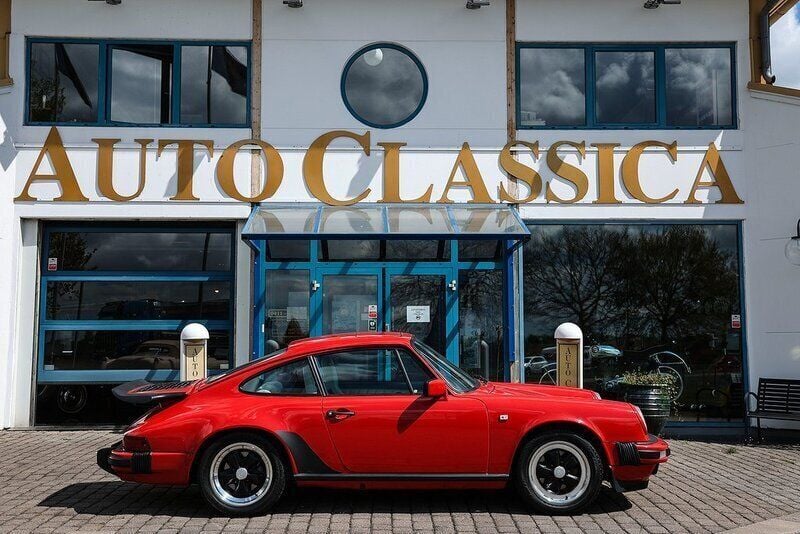 Röd Begagnad 1986 Porsche 911 Carrera | 699 000 kr - Bild 1/4
