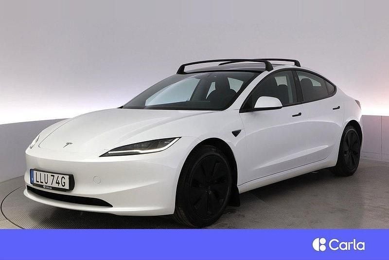 Vit Begagnad 2024 Tesla Model 3 Long Range Sedan | 489 900 kr - Bild 1/4