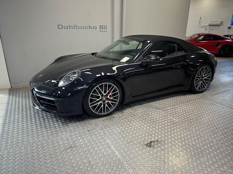 Svart Begagnad 2023 Porsche 911 Carrera 4S Cabriolet Sport Cab | 1 650 000 kr - Bild 1/4