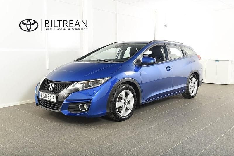 Blå metallic Begagnad 2015 Honda Civic Elegance Kombi | 134 900 kr (Marknadspris) - Bild 1/4