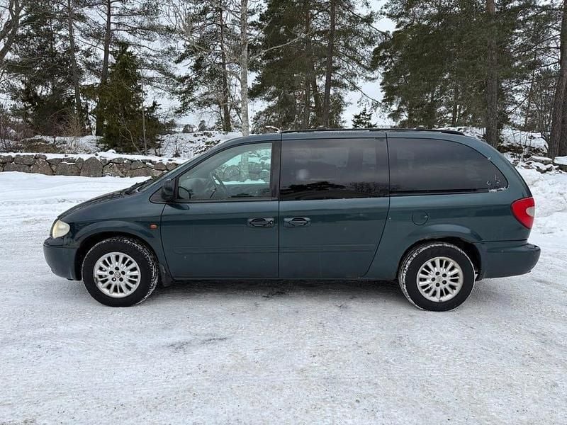 Mörkgrön Begagnad 2006 Chrysler Grand Voyager Minibuss | 23 900 kr (Marknadspris) - Bild 1/4
