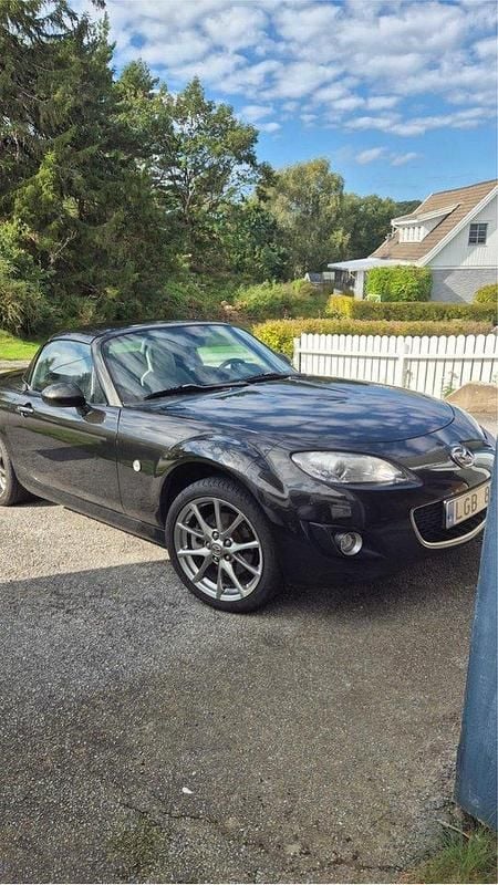 Svart Begagnad 2011 Mazda MX5 Cab | 160 000 kr (Marknadspris) - Bild 1/4