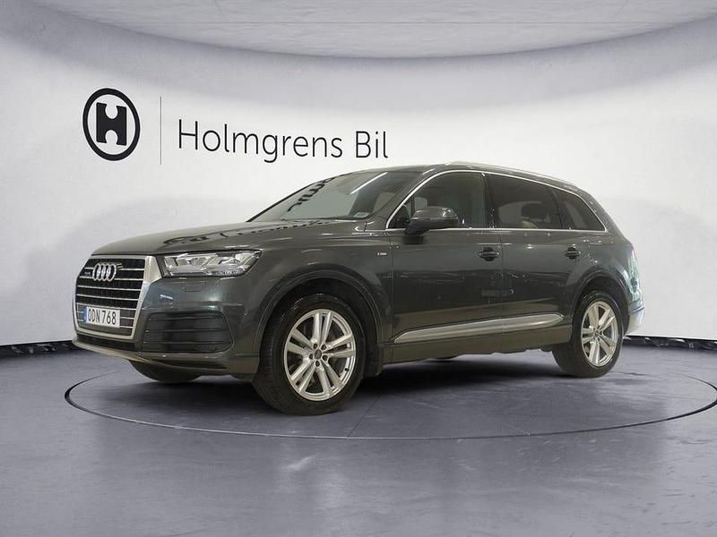 Grå Begagnad 2016 Audi Q7 S-Line SUV | 354 900 kr (Bra pris) - Bild 1/4