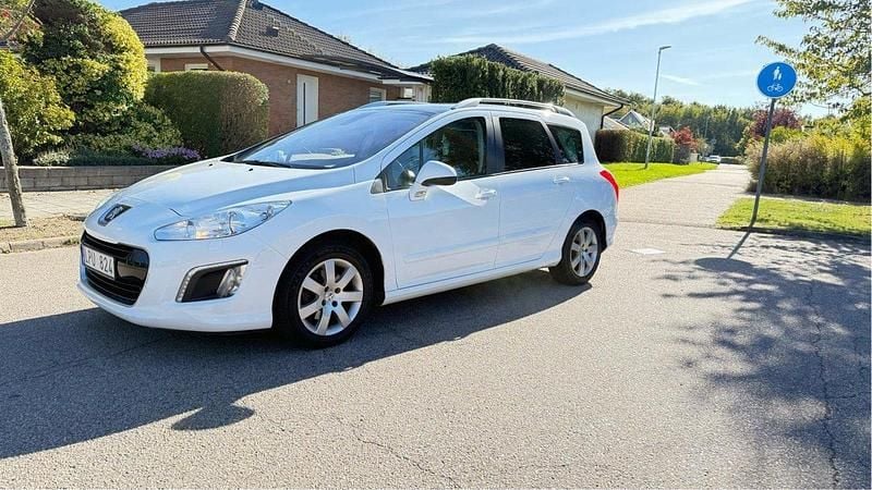 Vit Begagnad 2011 Peugeot 308 Kombi | 49 900 kr (Marknadspris) - Bild 1/4