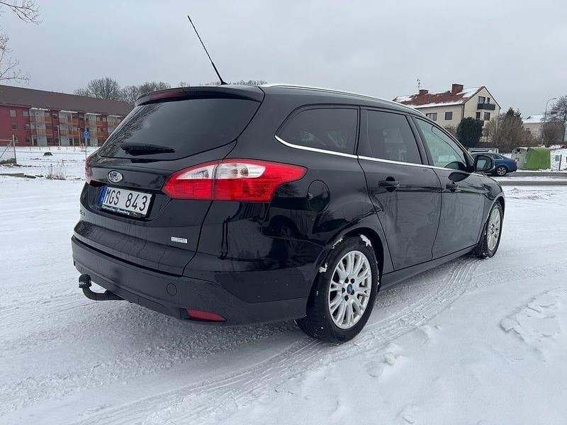 Begagnad Ford Focus Titanium 116 HK (85 kW) 2011 Svart Kombi
