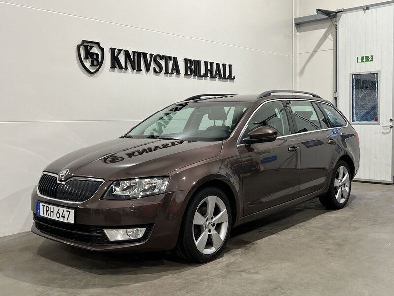 Mörkbrun Begagnad 2014 Skoda Octavia Ambition Kombi | 108 900 kr (Lite dyr) - Bild 1/4
