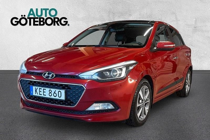 Röd (chili röd metallic) Begagnad 2015 Hyundai i20 Premium Halvkombi | 69 900 kr - Bild 1/3