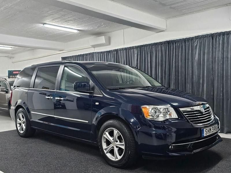 Blå Begagnad 2012 Lancia Voyager Minibuss | 135 000 kr (Lite dyr) - Bild 1/4