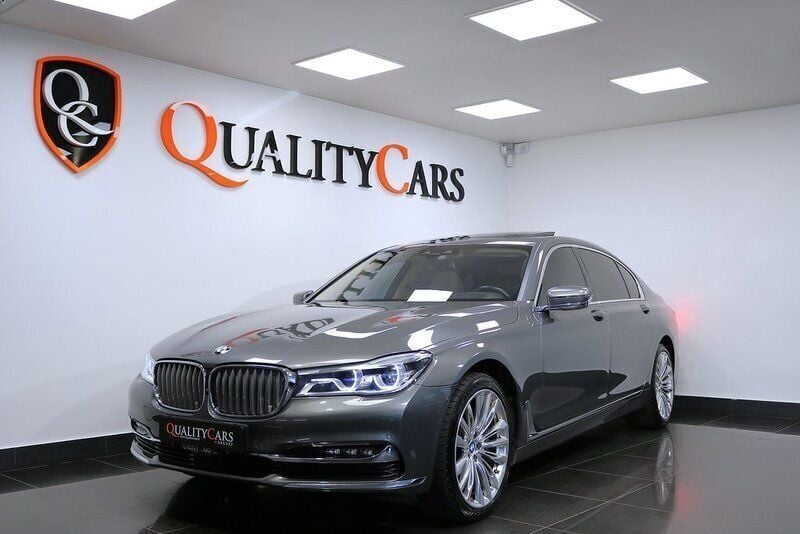 Grå Begagnad 2015 BMW 750L Executive Sedan | 368 900 kr - Bild 1/4