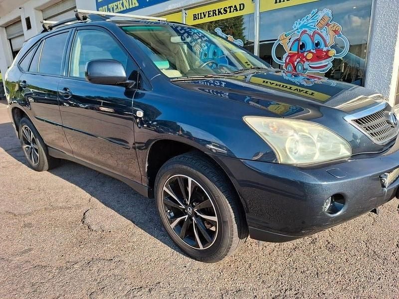 Mörkblå Begagnad 2006 Lexus RX400h SUV | 59 900 kr (Marknadspris) - Bild 1/4