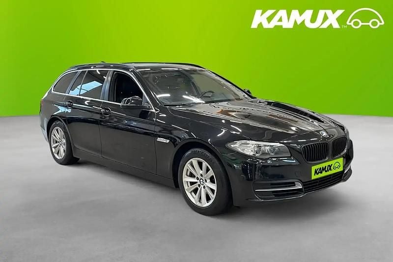 Svart Begagnad 2014 BMW 520 Kombi | 159 800 kr (Marknadspris) - Bild 1/4