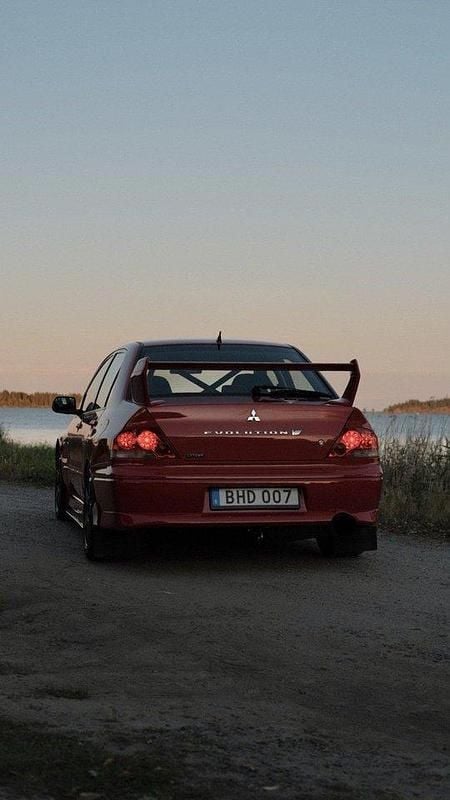 Röd Begagnad 2002 Mitsubishi Lancer Sedan | 190 000 kr - Bild 1/4