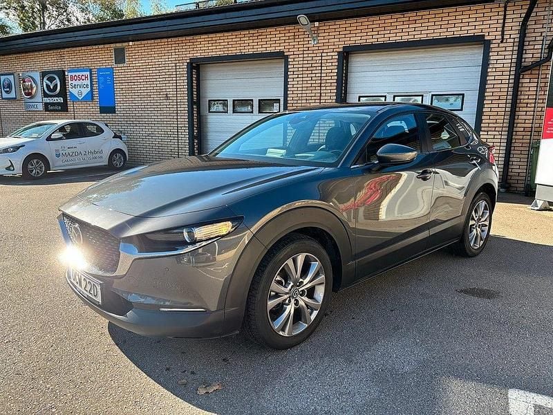 Machine grey metallic Begagnad 2019 Mazda CX-30 Sky SUV | 229 500 kr (Marknadspris) - Bild 1/4