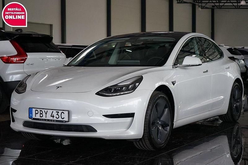 Vit Begagnad 2020 Tesla Model 3 Standard Range Plus Sedan | 235 000 kr (Marknadspris) - Bild 1/4