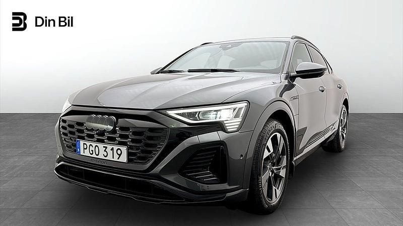 Daytonagrå pärleffekt Begagnad 2023 Audi Q8 Sportback e-tron S-Line SUV | 729 000 kr - Bild 1/4
