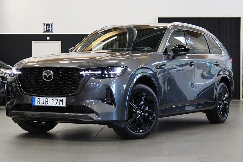 Machine grey Begagnad 2024 Mazda CX-80 Homura-Line SUV | 589 900 kr (Marknadspris) - Bild 1/4