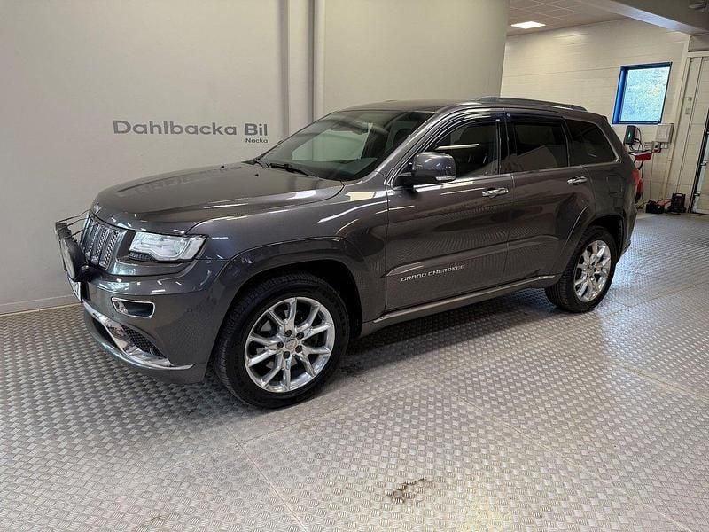 Grå Begagnad 2014 Jeep Grand Cherokee Summit SUV | 179 000 kr (Bra pris) - Bild 1/4