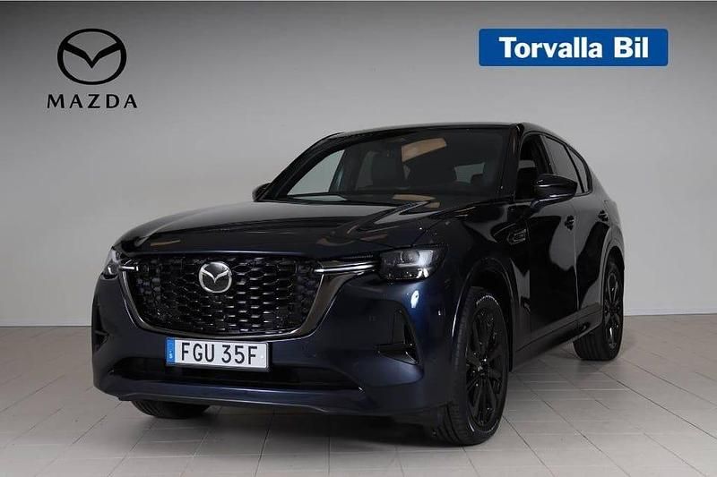 Blå Begagnad 2024 Mazda CX-60 Homura-Line SUV | 519 900 kr (Marknadspris) - Bild 1/4