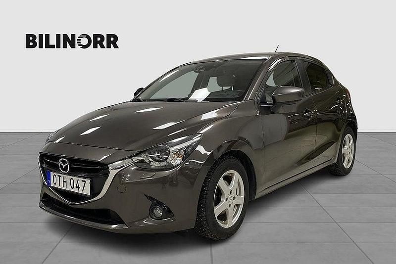 Brun Begagnad 2015 Mazda 2 Active Halvkombi | 114 000 kr (Marknadspris) - Bild 1/4