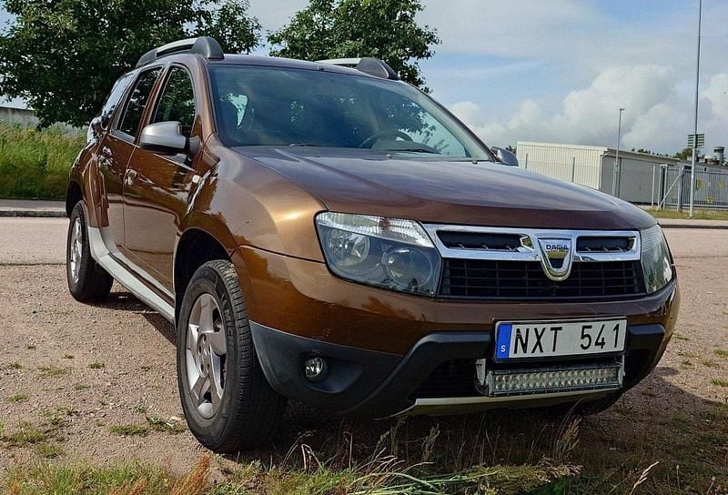 Brun Begagnad 2014 Dacia Duster SUV | 49 000 kr (Bra pris) - Bild 1/4