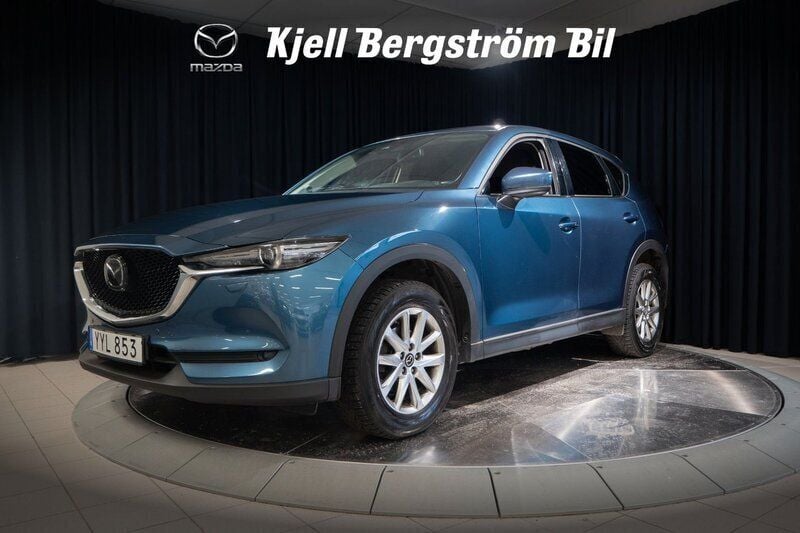 Blå metallic Begagnad 2017 Mazda CX-5 Optimum SUV | 259 000 kr (Marknadspris) - Bild 1/4