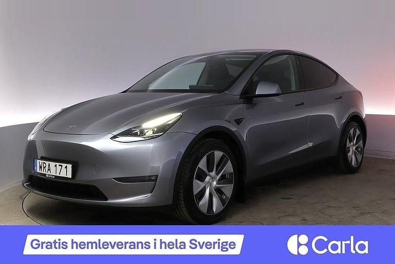 Begagnad Tesla Model Y Long Range AWD 378 kW (514 HK) 2023 Grå SUV