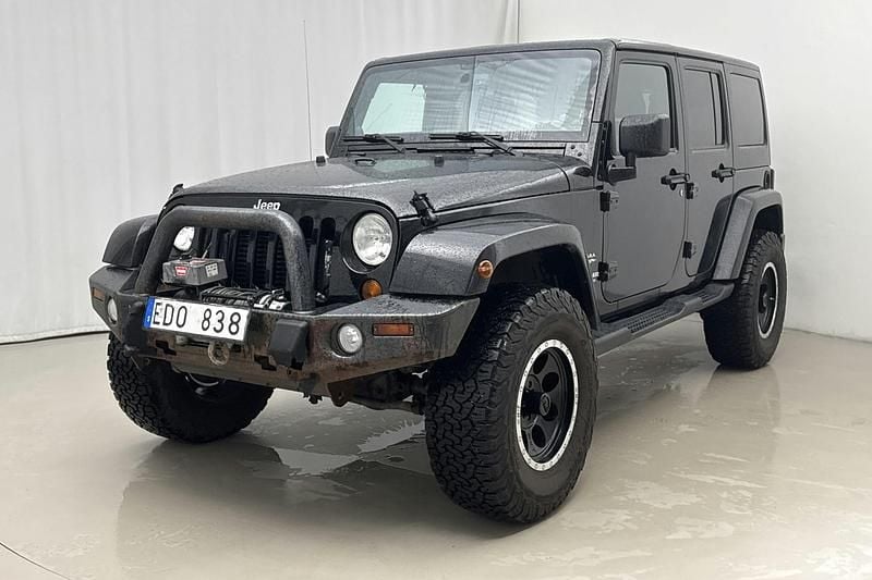 Svart Begagnad 2013 Jeep Wrangler Unlimited SUV | 195 000 kr (Marknadspris) - Bild 1/4
