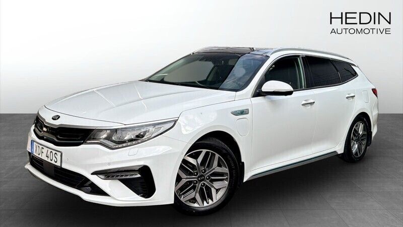 Vit (white) Begagnad 2019 Kia Optima Hybrid 2 Sedan | 209 900 kr (Marknadspris) - Bild 1/4
