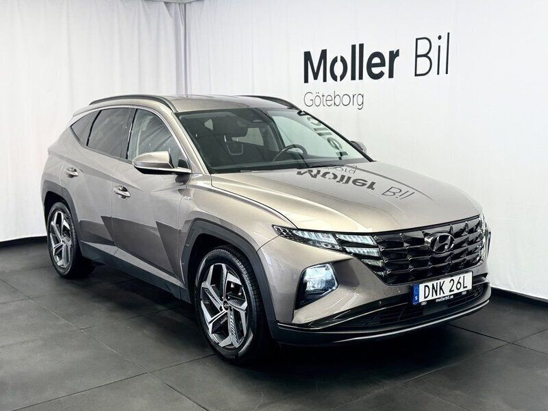 Brun Begagnad 2021 Hyundai Tucson Advanced SUV | 254 900 kr (Marknadspris) - Bild 1/4