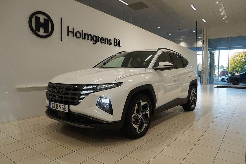 Vit Begagnad 2022 Hyundai Tucson Advanced SUV | 398 800 kr (Dyr) - Bild 1/4