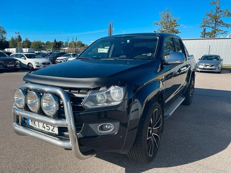Svart (svart metallic) Begagnad 2014 VW Amarok Highline Pickup | 165 000 kr (Marknadspris) - Bild 1/2