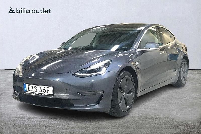 Grå Begagnad 2019 Tesla Model 3 Long Range Sedan | 239 900 kr (Marknadspris) - Bild 1/3