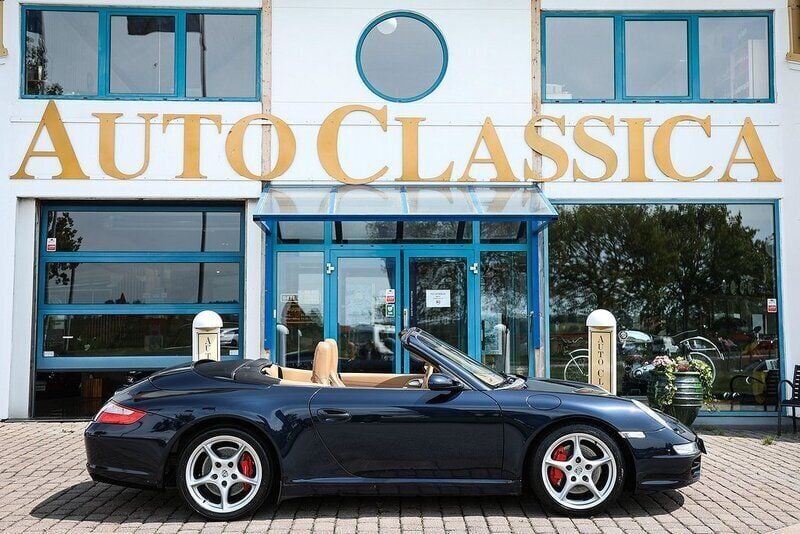 Mörkblå metallic Begagnad 2006 Porsche 911 Carrera S Cabriolet Sport Cab | 485 000 kr - Bild 1/4