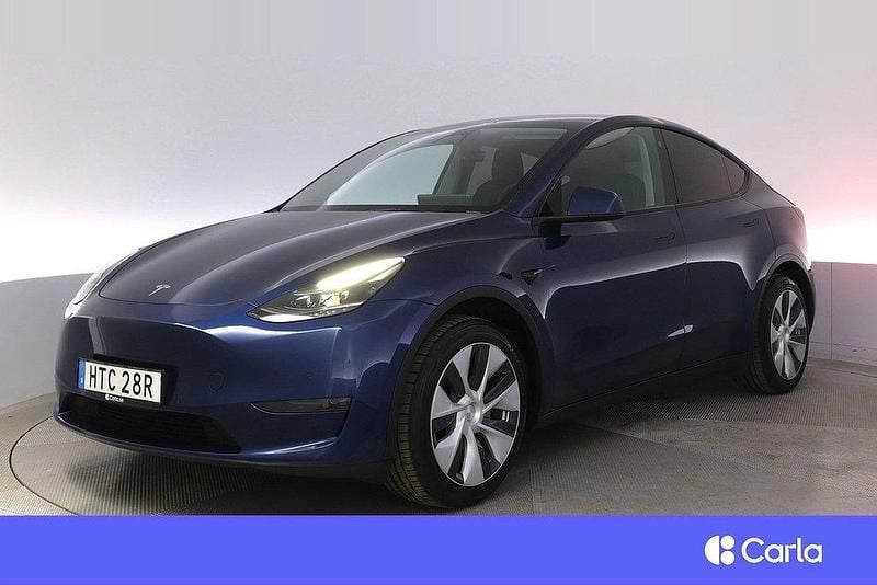 Blå Begagnad 2022 Tesla Model Y Long Range AWD SUV | 387 900 kr (Marknadspris) - Bild 1/4