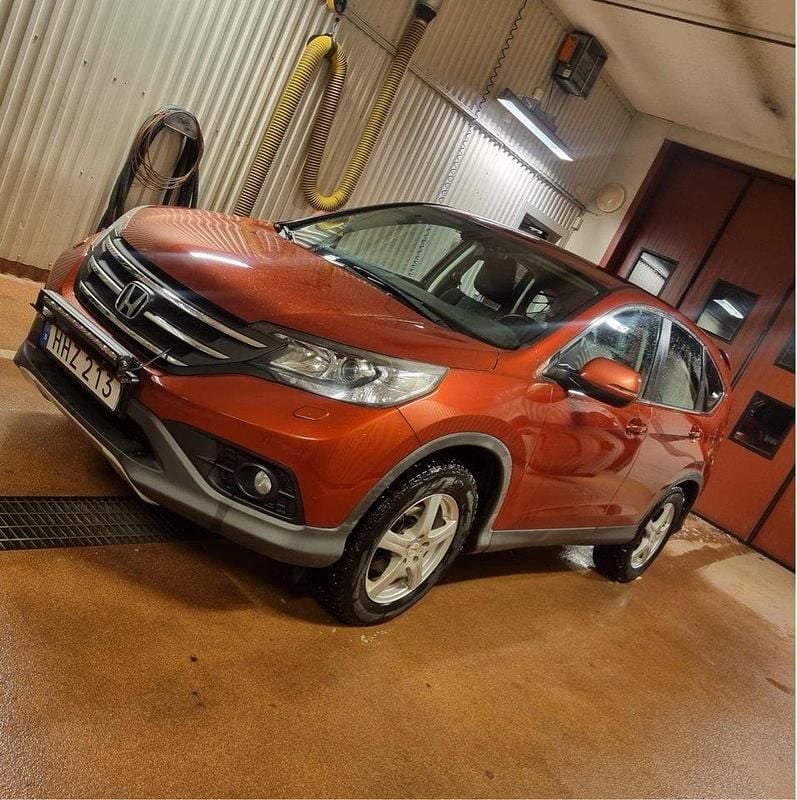 Röd Begagnad 2014 Honda CR-V Elegance SUV | 149 000 kr (Marknadspris) - Bild 1/4