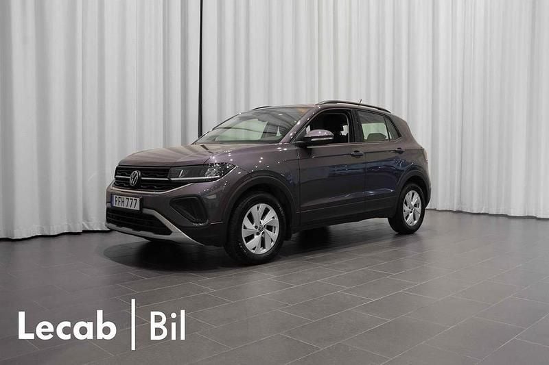 Grå (smokey grey metallic) Begagnad 2024 VW T-Cross Life SUV | 214 500 kr (Marknadspris) - Bild 1/4